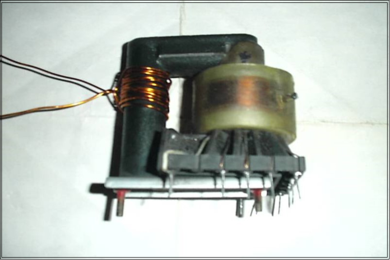 Commercial fly back transformer used in the                  experiment (Fig.13). Left coil (12 turns) served for simulation of the electron current Ielectron whereas the right one (400 turns) served for simulation of the phonon current Iphonon.